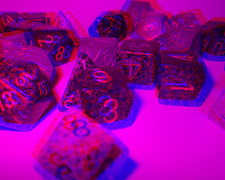 The same picture of dice, only for those red/blue 3D glasses.